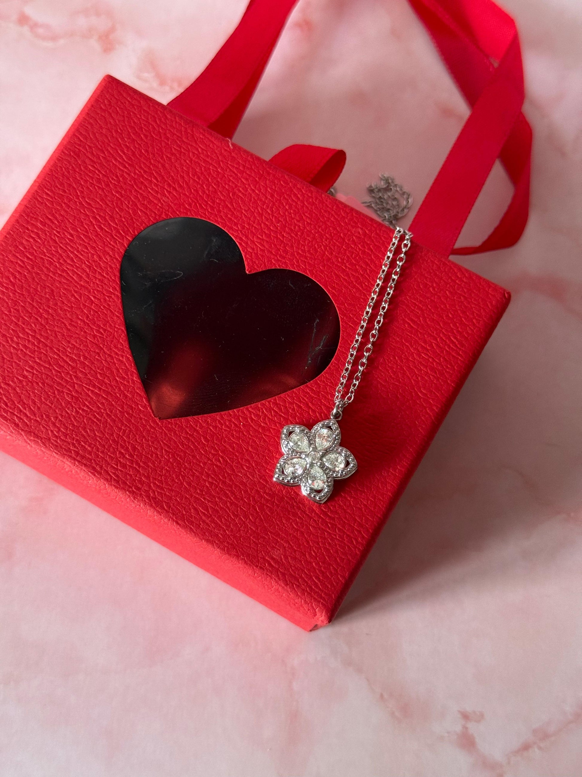 Collana fiore girevole