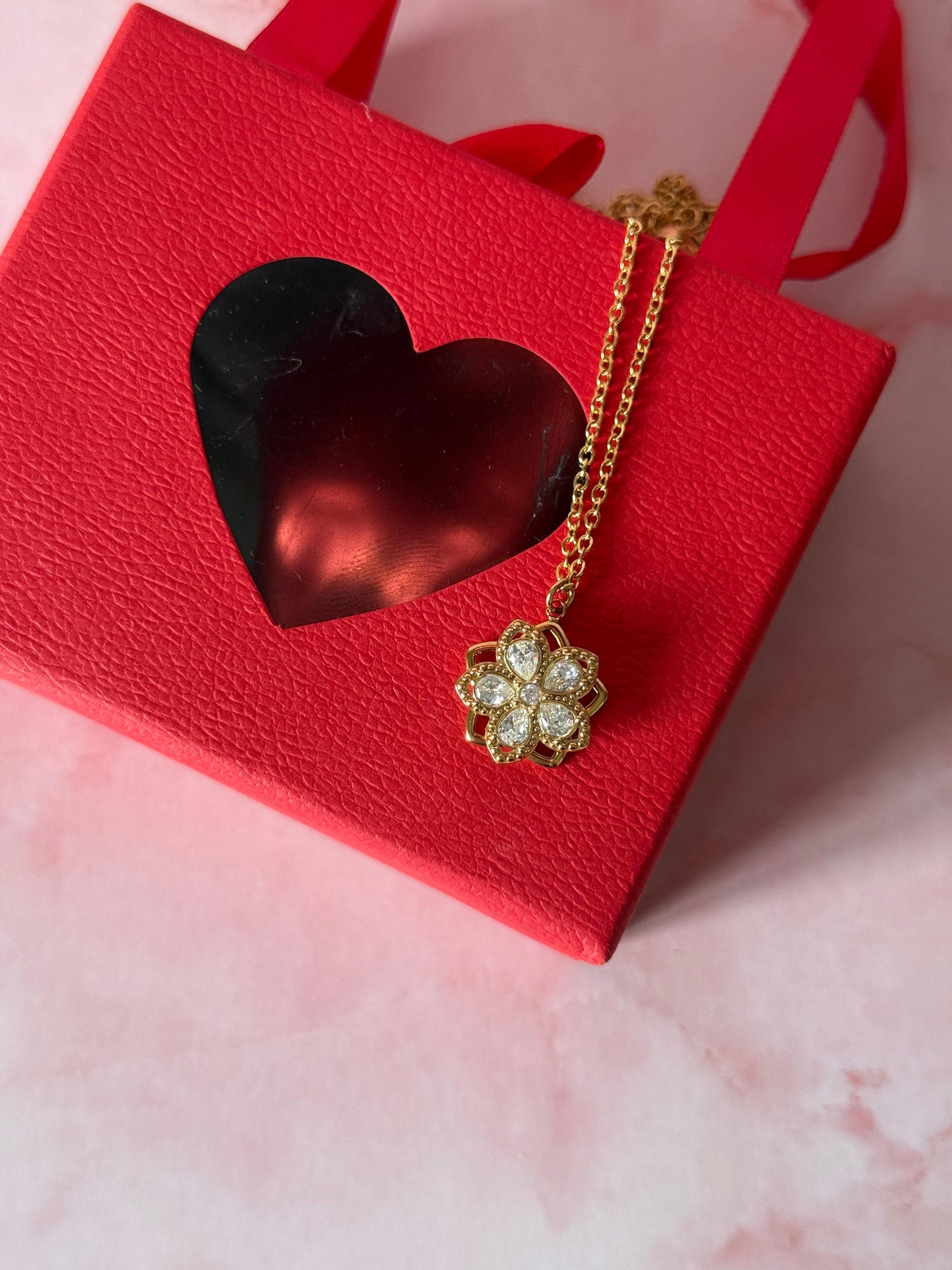 Collana fiore girevole